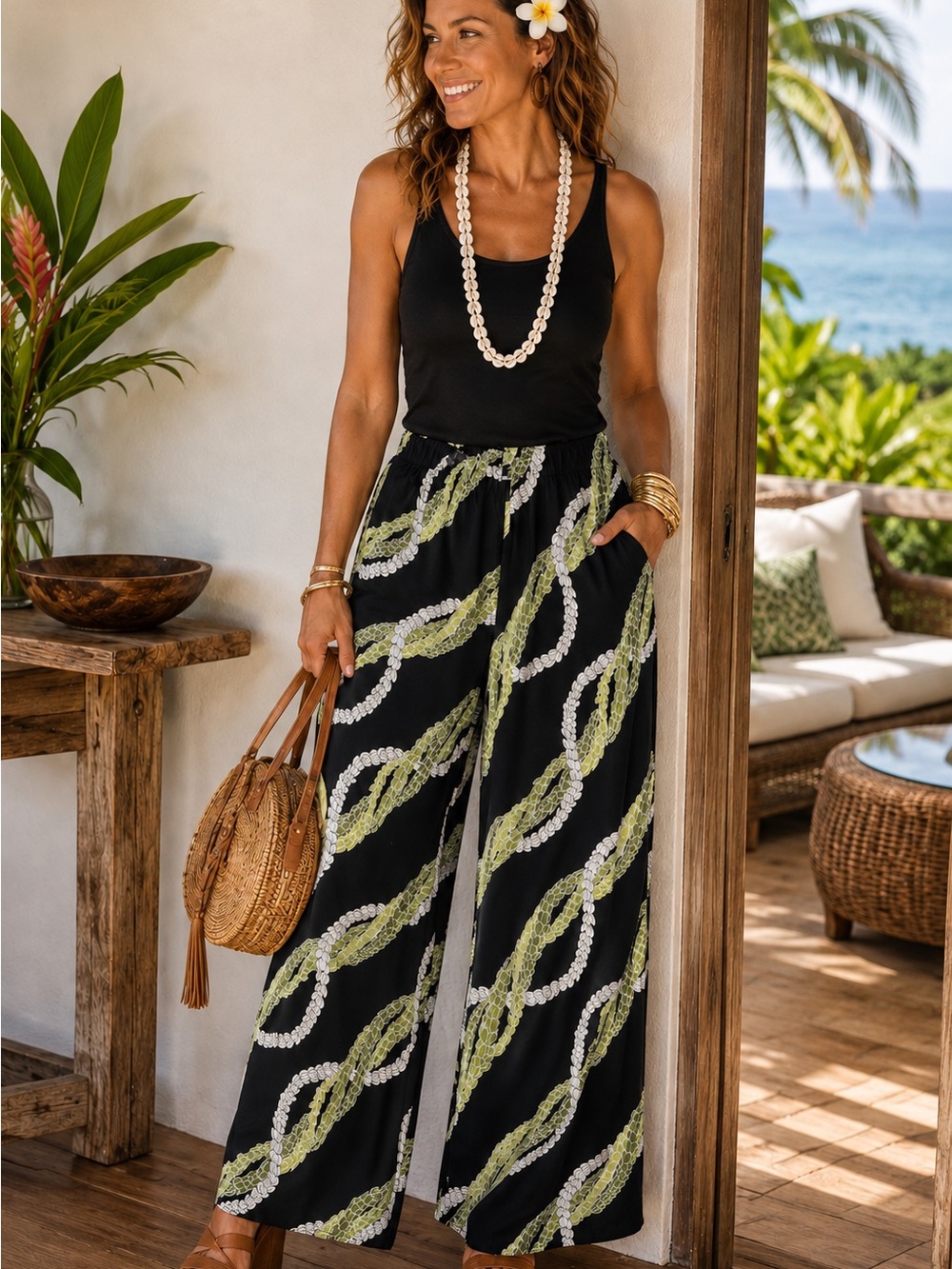 Women’s Black Printed wide leg pants with Lime & White lei pattern size Medium